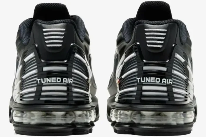Rear view of Nike Air Max Plus 3 in black, navy, and white showing the Tuned Air heel detail. - SKU CD7005-003
