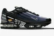 Side view of Nike Air Max Plus 3 sneakers in black, navy blue, and white with visible Air units. - SKU CD7005-003