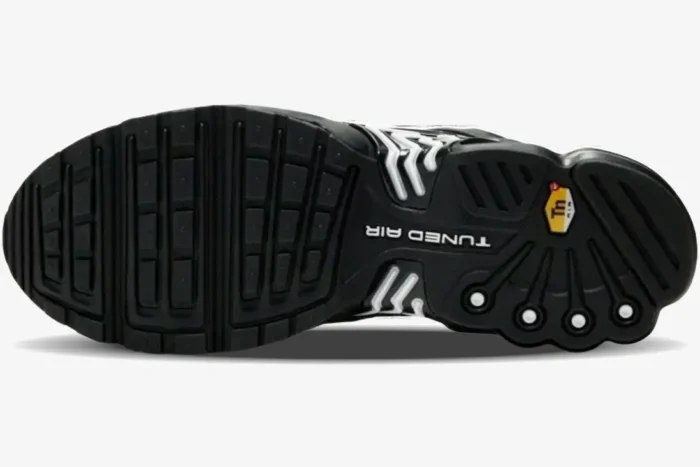 Outsole view of Nike Air Max Plus 3 in black, navy, and white featuring Tuned Air branding. - SKU CD7005-003