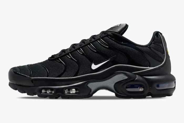 Black Nike Air Max Plus Reflective shoe shown from a side profile perspective. - SKU 604133-050
