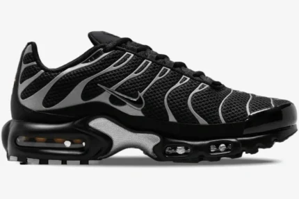 Nike Air Max Plus in black and reflective silver, side profile view showing mesh upper and Air units. - SKU HQ3029-001