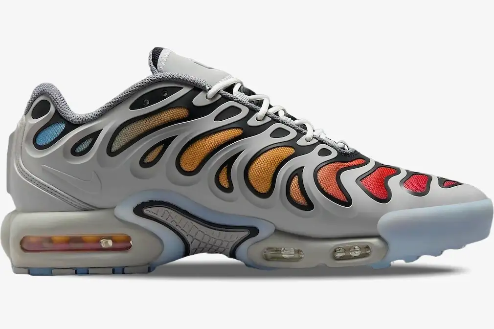 nike-air-max-plus-drift-smoke-grey-orange-side-fd4290-002-527-920 Side view of Nike Air Max Plus Drift in Smoke Grey with orange and red gradient mesh. - SKU FD4290-002