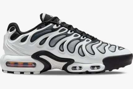 Nike Air Max Plus Drift sneaker in white and black, side profile view with visible air cushioning. - SKU FV4081-102