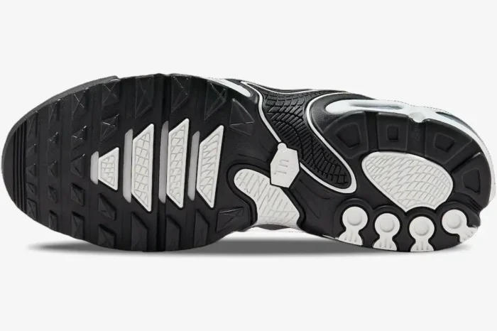 Bottom view of Nike Air Max Plus Drift in white and black, showing the detailed rubber outsole tread pattern. - SKU FV4081-102