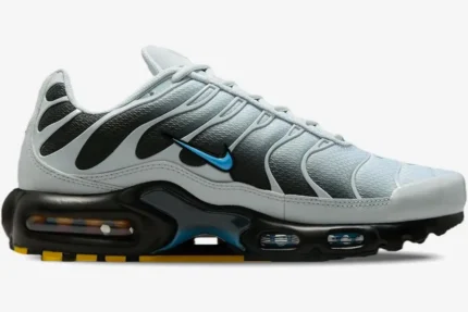 Nike Air Max Plus in grey and university blue, side profile view showing the gradient mesh and black overlays. - SKU DM0032-015