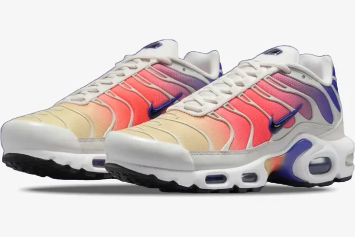 Nike Air Max Plus Persian Violet and Light Wild Mango sneakers shown from a three-quarter front angle. - SKU DZ3670-003