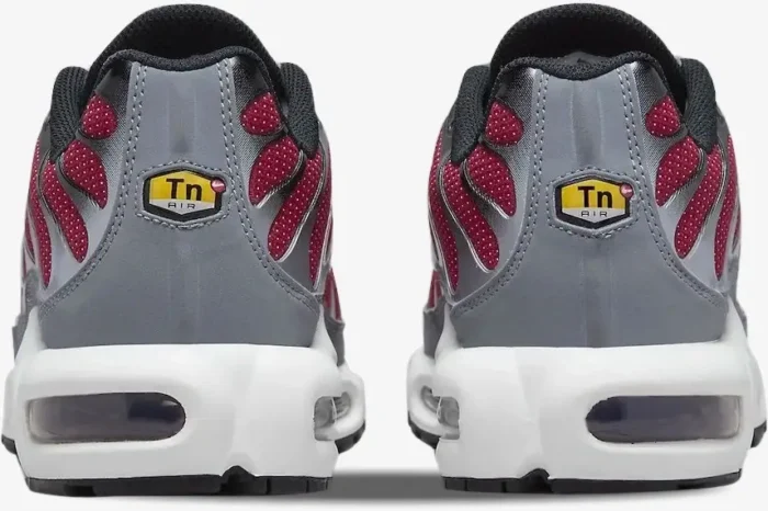 Back view of Nike Air Max Plus red, grey, and white sneakers showing heel logo and air units. - SKU DQ3983-600