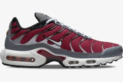 Nike Air Max Plus sneaker in red, grey, and white, shown from a side profile view. - SKU DQ3983-600