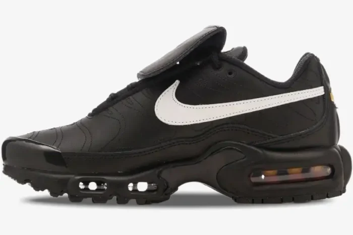 Side profile of Nike Air Max Plus Tiempo Black White Leather Hybrid sneaker with a fold-over tongue. - SKU HF0074-001