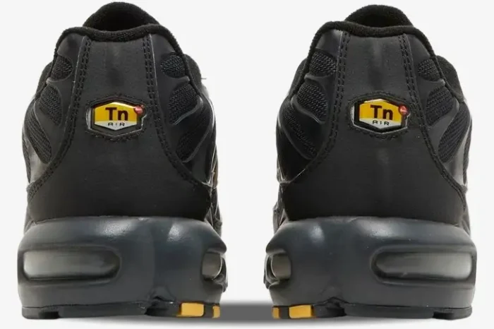 Rear view of Nike Air Max Plus TN Black Gold Snakeskin sneakers showing the iconic Tn Air heel logo. - SKU BQ3169-002