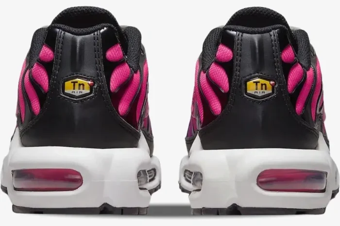 Rear view of Nike Air Max Plus TN Dusk sneakers in pink, purple, and black. - SKU DZ3670-500