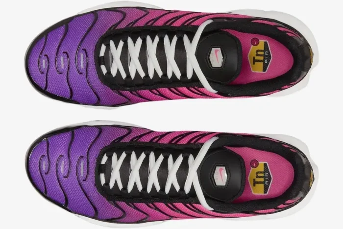 Top-down view of Nike Air Max Plus TN Dusk sneakers with purple to pink gradient and white laces. - SKU DZ3670-500