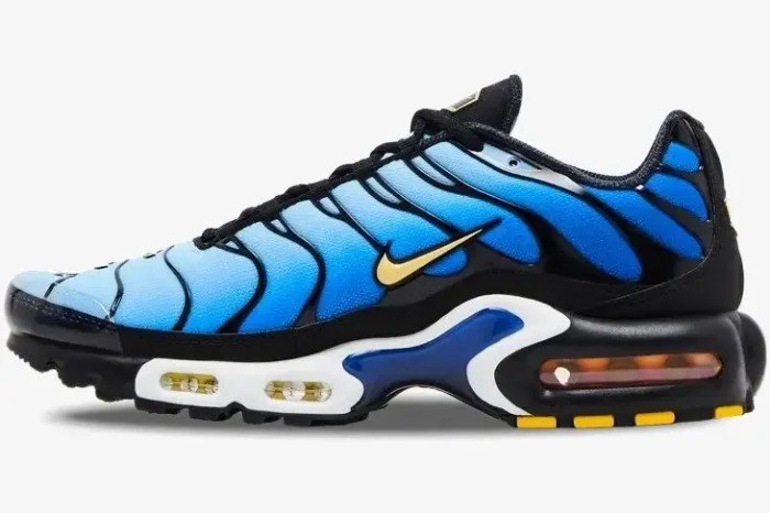 Side view of Nike Air Max Plus TN Hyper Blue OG Retro sneakers featuring a blue gradient and gold swoosh. - SKU DX0755-001