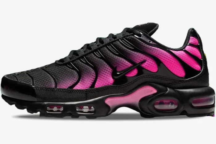Side view of Nike Air Max Plus TN shoes featuring a black to pink gradient upper and black overlays. - SKU DM0032-020