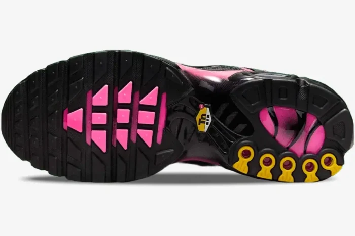 Bottom view of Nike Air Max Plus TN Pink Black Gradient outsole with pink and yellow details. - SKU DM0032-020