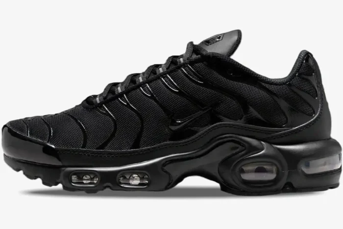 Side profile of the Nike Air Max Plus TN Triple Black sneaker featuring its signature wavy design and visible Air units. - SKU DM2362-002