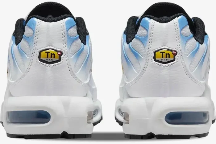 Rear view of Nike Air Max Plus shoes in white and university blue with yellow Tn Air logos on the heels. - SKU DM0032-101