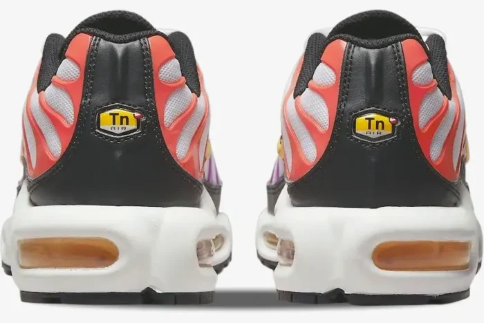 Rear view of Nike Air Max Plus sneakers in white, red, and magenta gradient with Tn Air heel logo. - SKU DZ3671-100