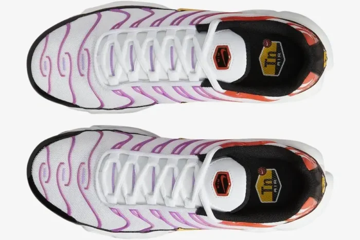 Top-down view of Nike Air Max Plus sneakers featuring white mesh and a red to magenta gradient cage. - SKU DZ3671-100