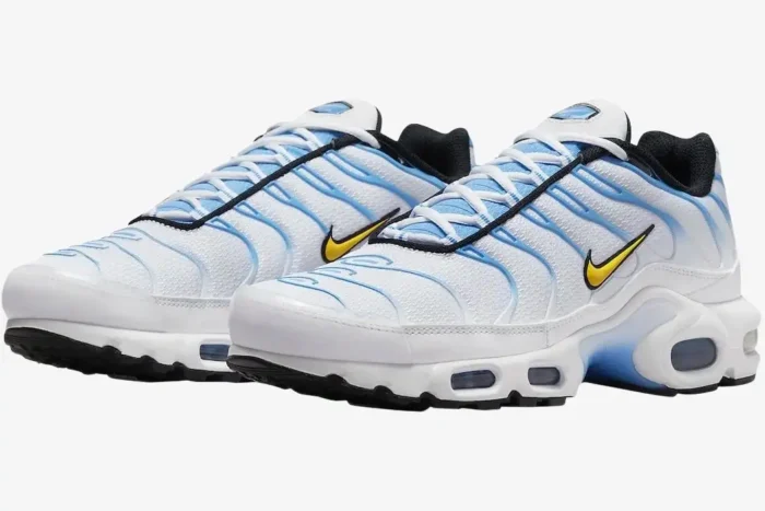 Nike Air Max Plus sneakers in white and university blue, shown from a three-quarter side angle. - SKU DM0032-101