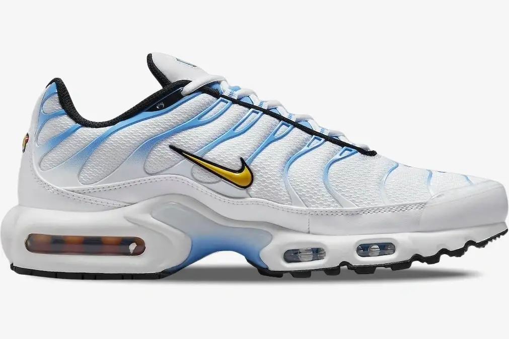 nike-air-max-plus-white-university-blue-side-view-dm0032-101-199-092 Nike Air Max Plus in White and University Blue, side profile view showing yellow Swoosh and visible Air units. - SKU DM0032-101