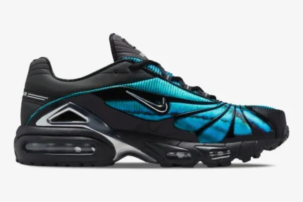 Nike Air Max Tailwind 5 x Skepta Chrome Blue sneaker side profile featuring iridescent blue patterns and silver accents. - SKU CQ8714-001