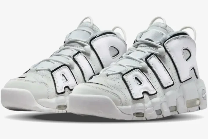 Nike Air More Uptempo '96 Photon Dust sneakers in light grey and white, three-quarter front view. - SKU FB3021-001