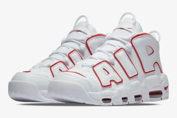 Nike Air More Uptempo '96 sneakers in white with red outlines, shown in a three-quarter front view. - SKU 921948-102