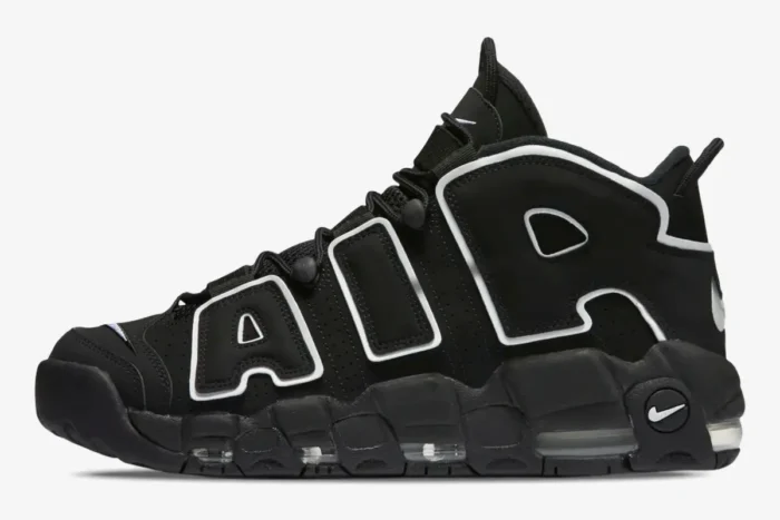 Side view of Nike Air More Uptempo sneakers in black and white with large AIR lettering. - SKU 414962-002