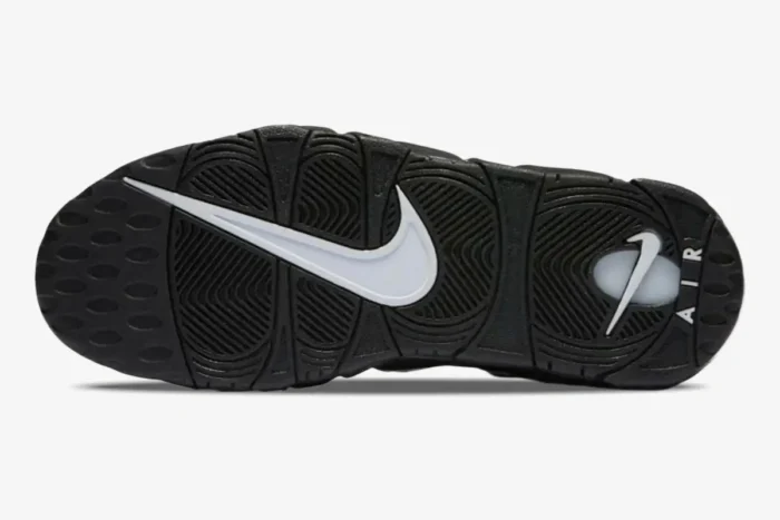 Bottom sole view of Nike Air More Uptempo Black White OG featuring a large white swoosh and black tread. - SKU 414962-002
