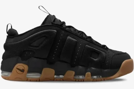 Nike Air More Uptempo Low in black with a gum sole, shown from a side profile view. - SKU FZ3055003