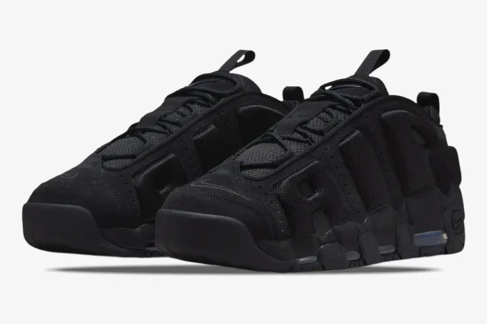 Nike Air More Uptempo Low in triple black, three-quarter front view on a white background. - SKU IM6649-001