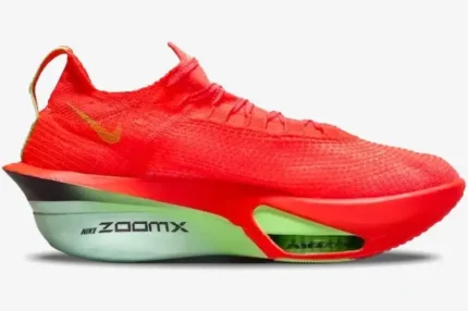 Nike Air Zoom Alphafly Next% 3 running shoe in orange and red with a green midsole, side view. - SKU FD8311-600
