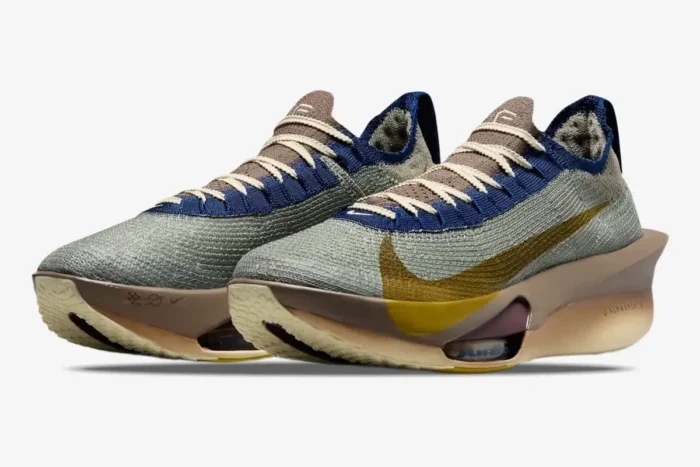 Nike Air Zoom Alphafly 3 Premium running shoes in grey, gold, and brown, shown from a front-side angle. - SKU HV4318-320