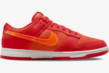Nike Dunk Low ATL Special Edition sneaker in red and orange suede, side profile view. - SKU FD0724-657