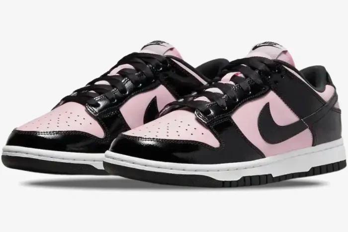 Nike Dunk Low Black Patent Pink women's sneakers shown from a three-quarter front perspective. - SKU DJ9955-600