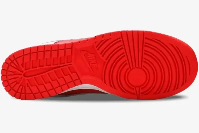 Bottom view of the Nike Dunk Low Championship Red showing the bright red rubber outsole and traction pattern. - SKU DD1391-600
