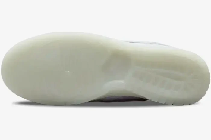 Bottom view of the Nike Dunk Low x CLOT x Fragment Design White Silk featuring a translucent white outsole. - SKU FN0315-110