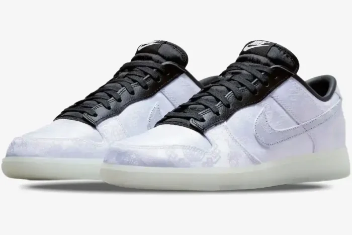 Nike Dunk Low x CLOT x Fragment Design White Silk sneakers in a three-quarter front view. - SKU FN0315-110