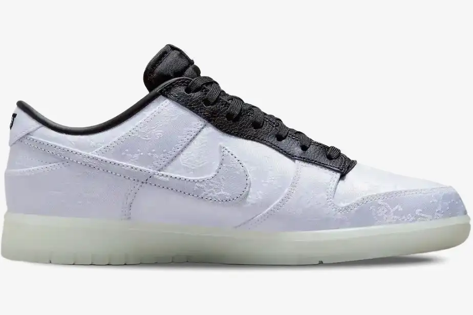 nike-dunk-low-clot-fragment-white-silk-side-fn0315-110 Side profile of Nike Dunk Low x CLOT x Fragment Design White Silk sneaker with patterned upper and black trim. - SKU FN0315-110