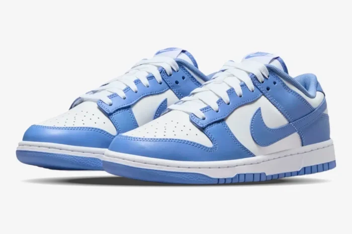 Nike Dunk Low Coast Retro women's sneakers in light blue and white, three-quarter front view. - SKU DD1503-102