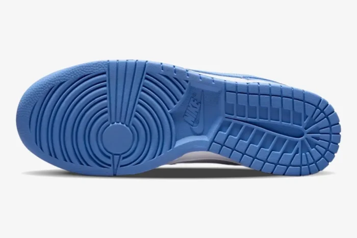 Bottom view of the Nike Dunk Low Coast Retro women's sneaker featuring a light blue rubber outsole. - SKU DD1503-102