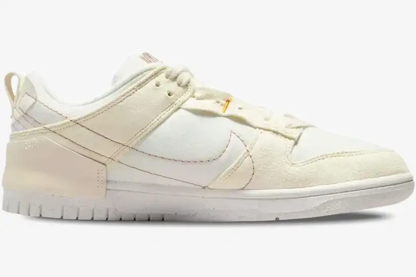 nike-dunk-low-disrupt-2-pale-ivory-sail-side-view-dh4402-101 Side profile of Nike Dunk Low Disrupt 2 sneakers in pale ivory and sail on a white background. - SKU DH4402-101