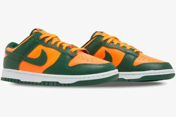 Nike Dunk Low Miami Hurricanes sneakers in Team Orange and Gorge Green, three-quarter side view of both shoes. - SKU DD1391-300