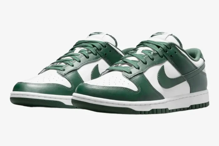 Nike Dunk Low Michigan State Spartan Green sneakers in white and green, three-quarter front view. - SKU DD1391-101