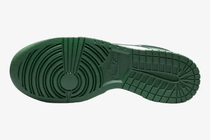 Sole view of the Nike Dunk Low Michigan State Spartan Green sneaker featuring a dark green rubber outsole. - SKU DD1391-101