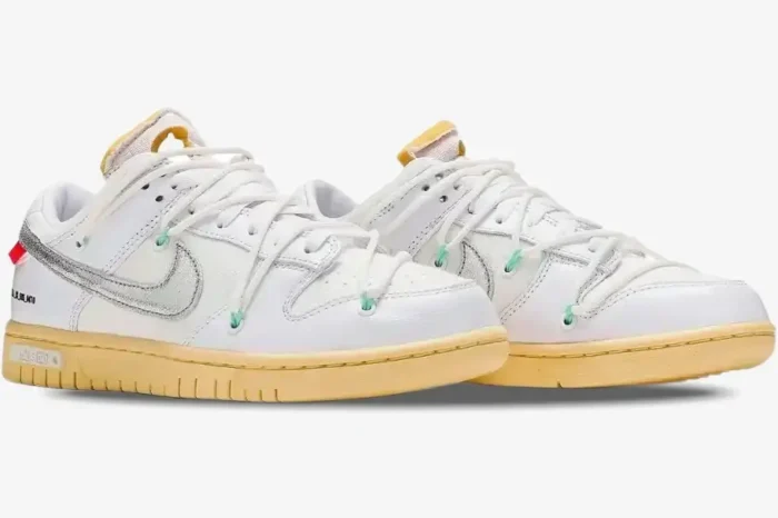 Nike Dunk Low x Off-White Lot 01 sneakers in white and silver, three-quarter side view. - SKU DM1602-127