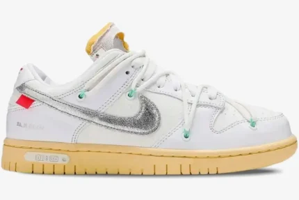 Side view of Nike Dunk Low x Off-White Lot 01 of 50 sneaker in white with a metallic silver swoosh and cream sole. - SKU DM1602-127