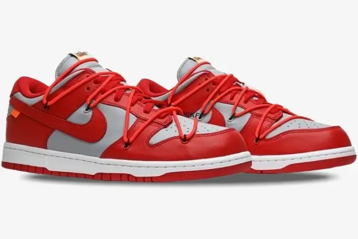 Nike Dunk Low x Off-White University Red sneakers in a three-quarter view with grey panels and red overlays. - SKU CT0856-600