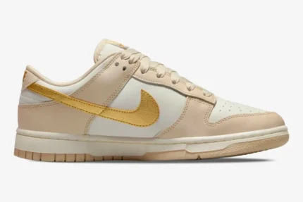 Nike Dunk Low Essential Trend Women's shoe in Phantom and Metallic Gold, side profile view. - SKU DX5930-001